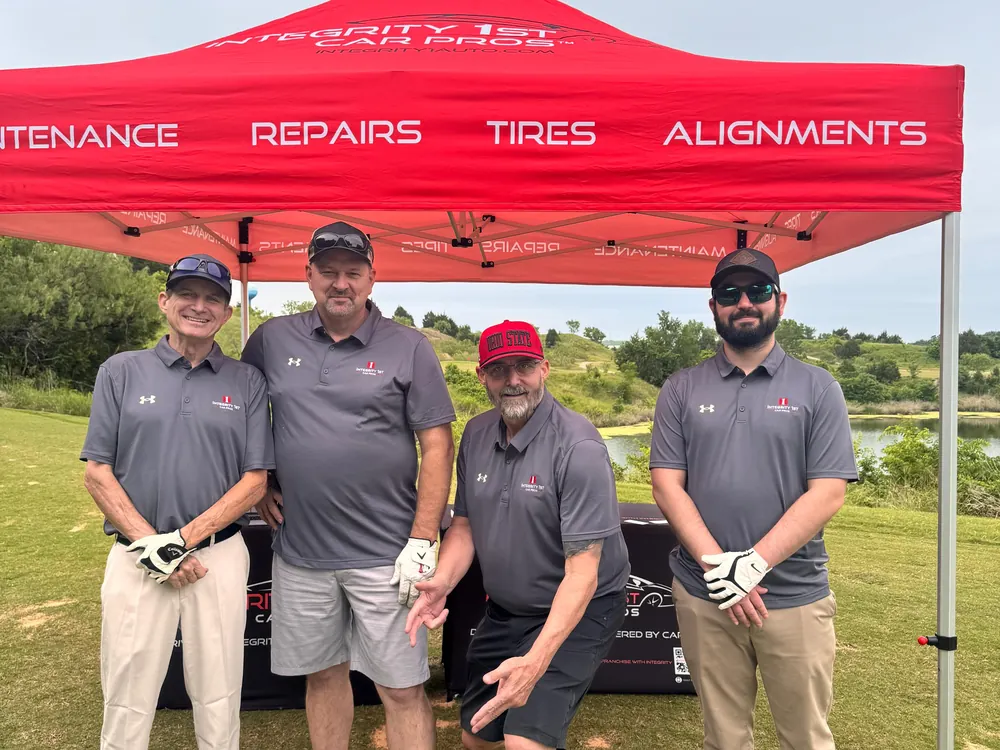 The Integrity 1st team on the course at the company golf tournament