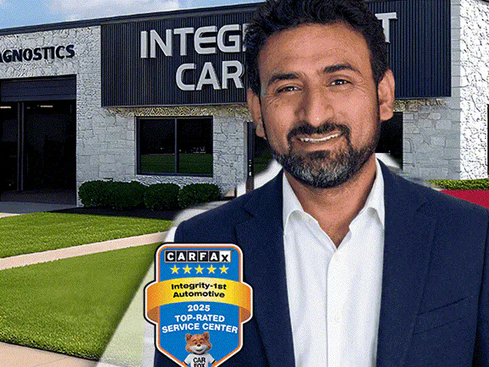 The manager of the Grapevine Integrity 1st Car Pros shop, outside the building