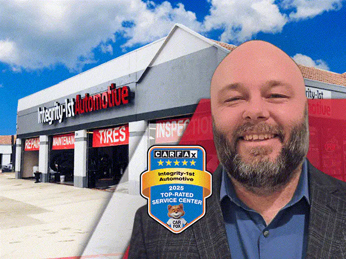 The manager of the Central Plano Integrity 1st Car Pros shop, outside the building