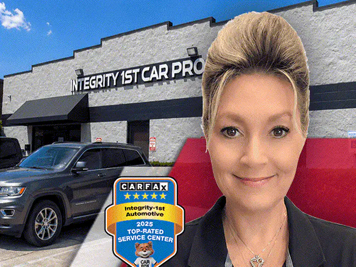 The manager of the Rowlett Integrity 1st Car Pros shop, outside the building