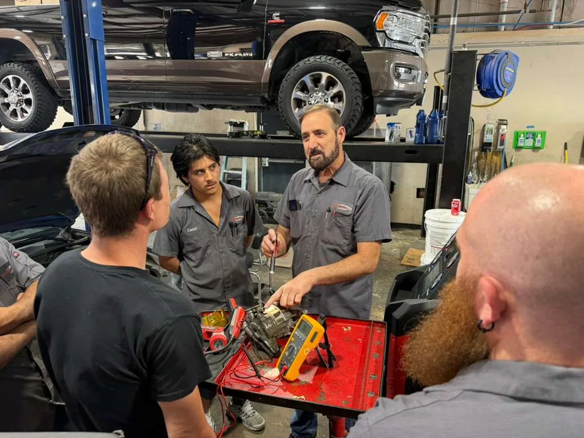A hands-on tool demonstration during Integrity 1st technician training