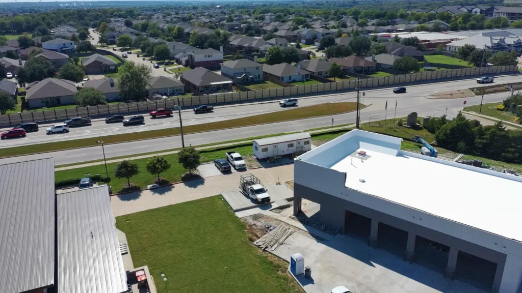 The Anna shop under construction seen from above across the highway frontage